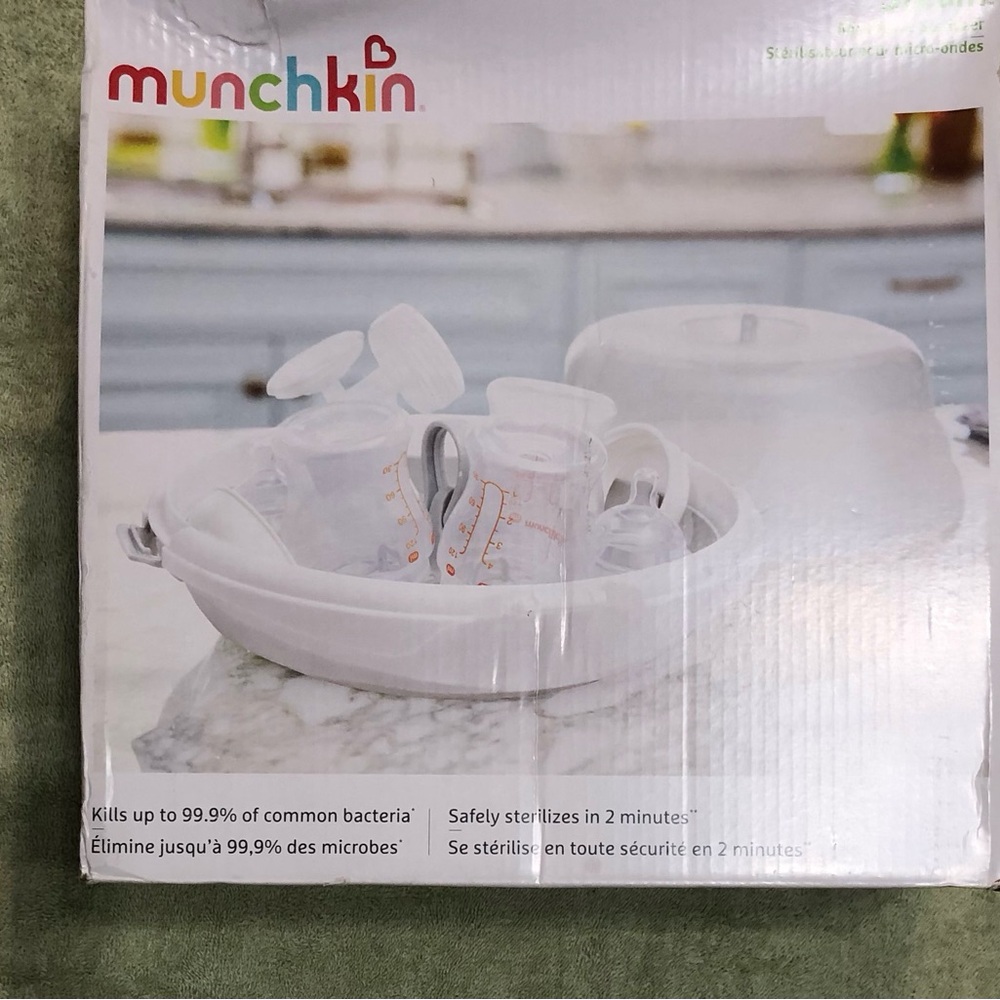 Munchkin steam microwave bottle sterilizer nipple pacifier. 11.30x12.50x6.70”
